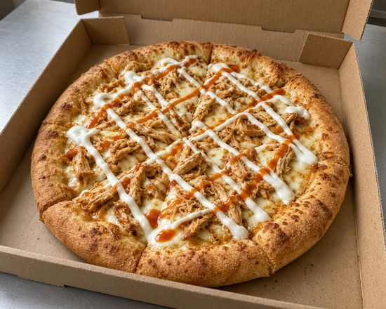 Shawarma pizza topped with chicken shawarma, garlic sauce and hot sauce
